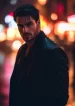 chonglaoban_a_mysterious_handsome_man_standing_under_dim_city_l_51988a5c-d8f0-48c3-87b0-862e3a45f976